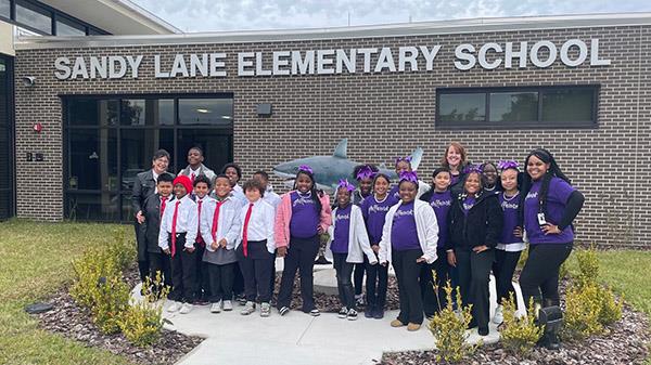 Members of Sandy Lane Elementary Girlfriends’ Club and 5000 Role Models are celebrating the work of Martin Luther King, Jr. by walking in the MLK Jr. parade in St. Pete.